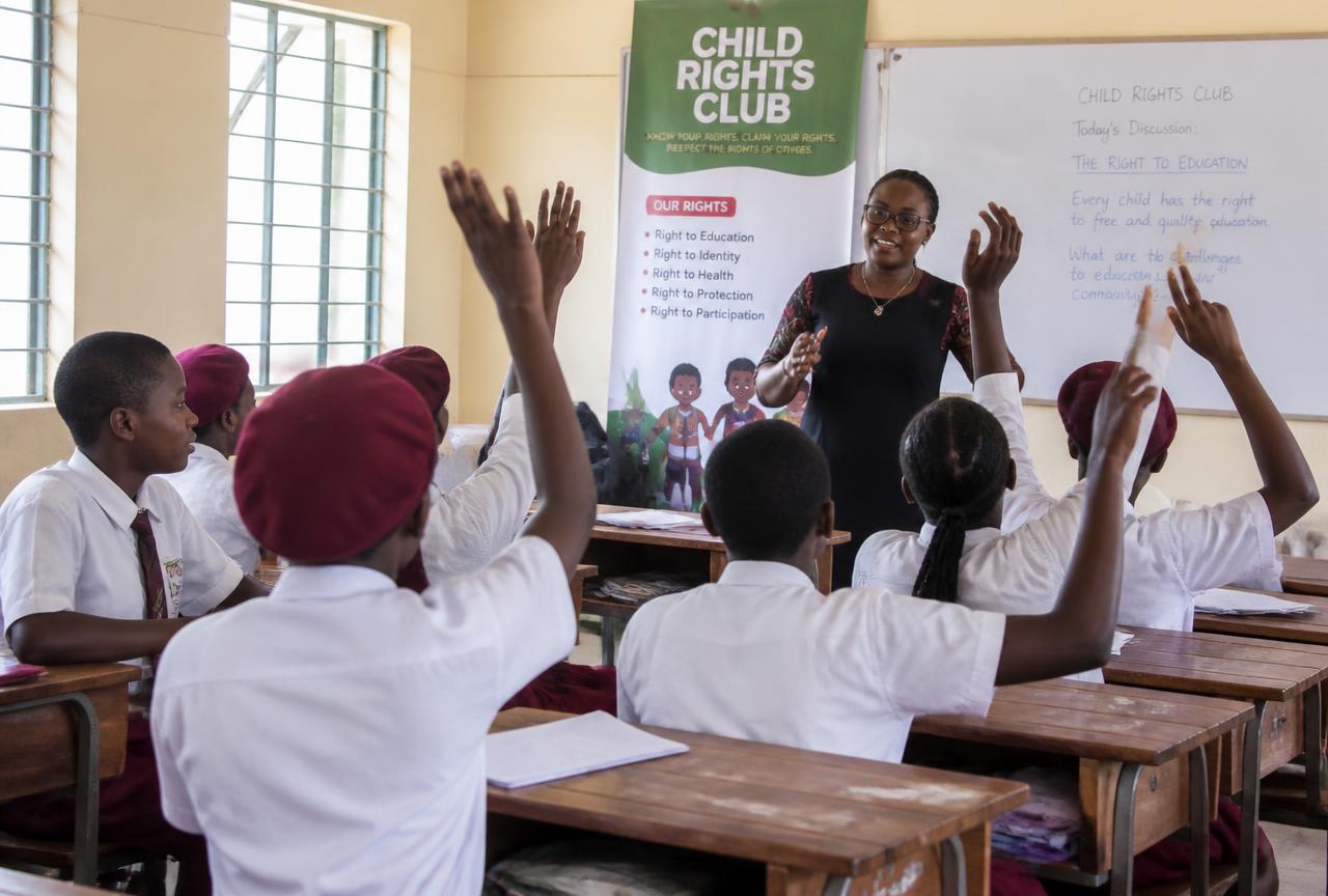 Placeholder photograph: secondary school students taking part in a classroom rights session